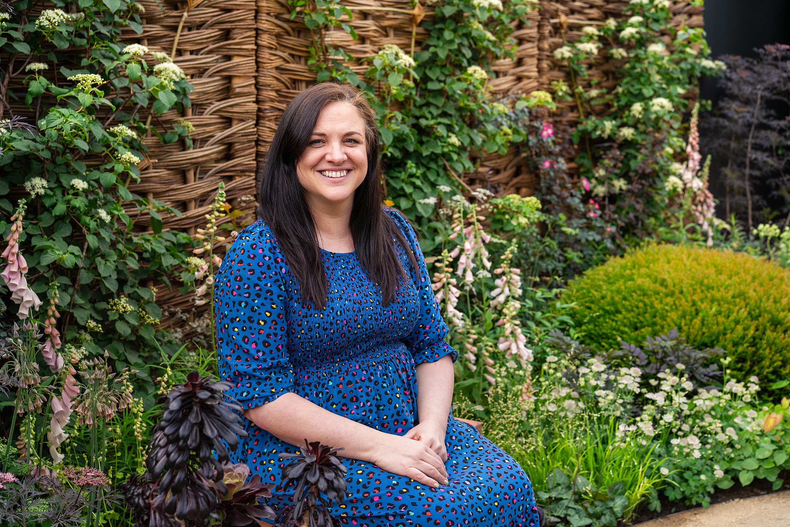 A close up shot of Lindsey Roberts (interim CEO at the ADHD Foundation) smiling in the garden